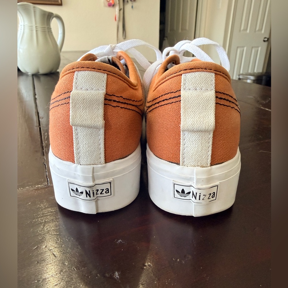 Adidias EUC Nizza low top platform
In orange canvas w/rubber toe
Woman’s size 8 - Picture 2 of 9